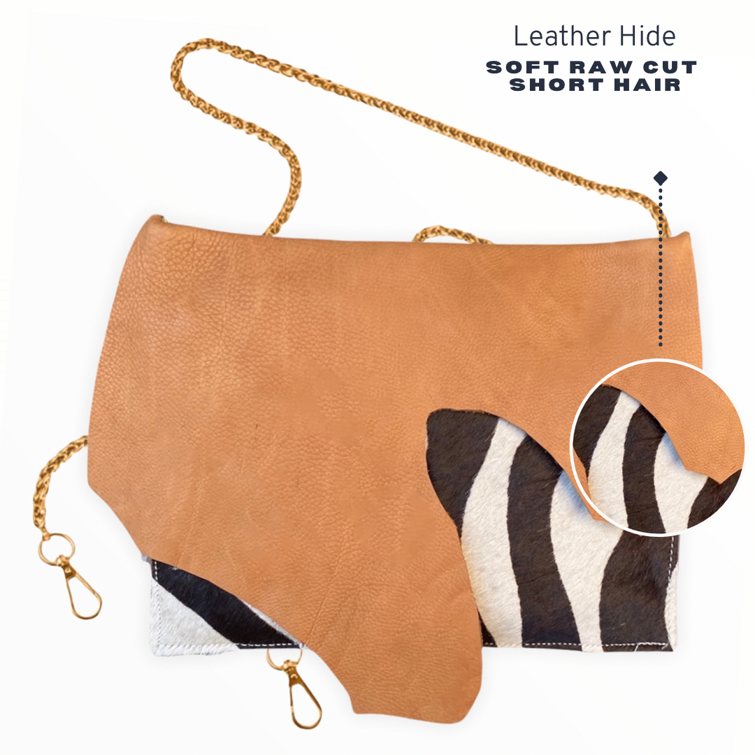 Kingdom Clutch - Dip Saddle Tan Zebra