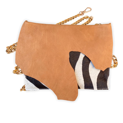 Kingdom Clutch - Dip Saddle Tan Zebra